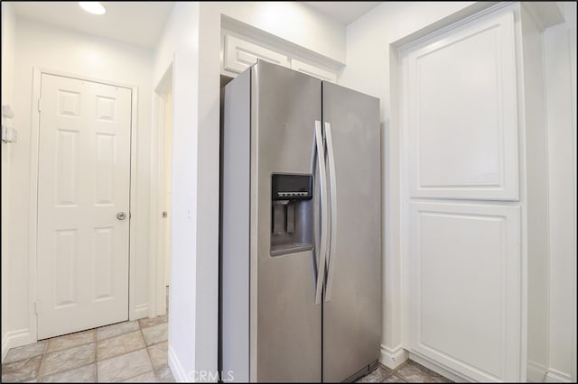 kitchen featuring stainless steel fridge