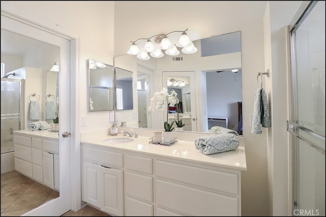 bathroom featuring vanity and tile patterned flooring