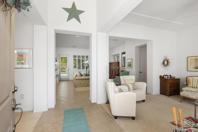 living area with light tile patterned flooring