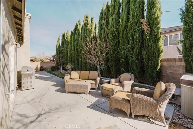 44620 Painted Desert St, Lancaster, CA 93536 - view of patio / terrace with a fenced backyard and an outdoor hangout area