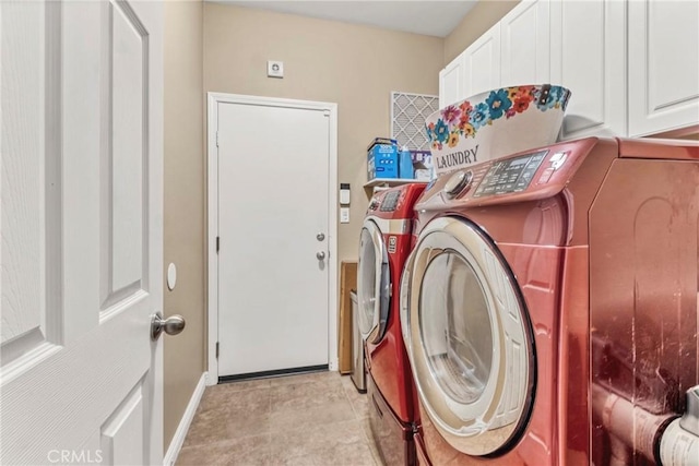 44620 Painted Desert St, Lancaster, CA 93536 - washroom with baseboards, cabinet space, and washer and clothes dryer