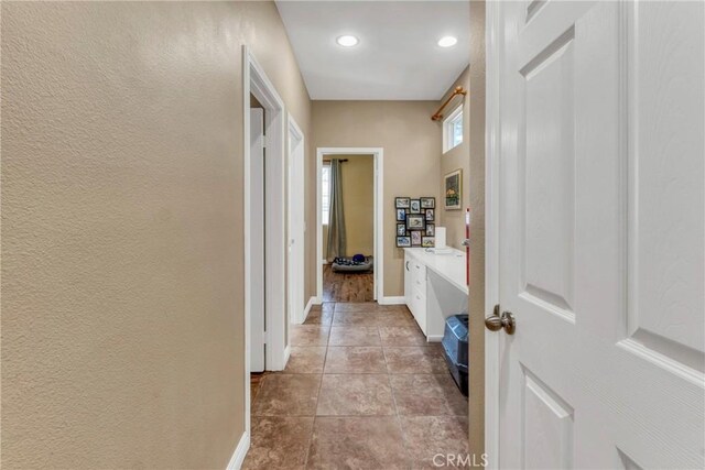 44620 Painted Desert St, Lancaster, CA 93536 - hall featuring a textured wall, recessed lighting, light tile patterned floors, and baseboards