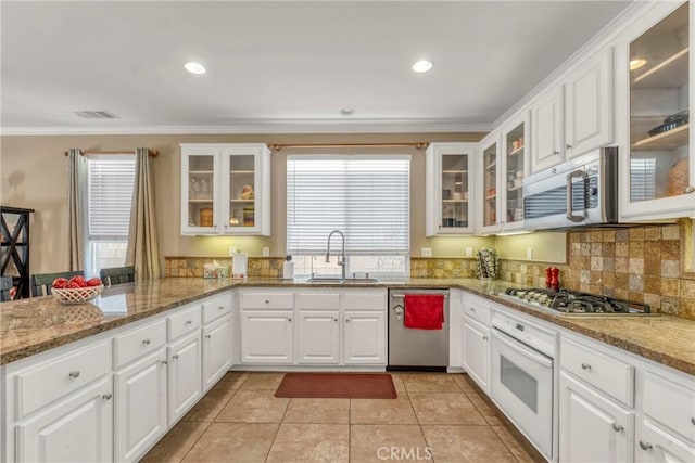 44620 Painted Desert St, Lancaster, CA 93536 - kitchen featuring stainless steel appliances, visible vents, a sink, and ornamental molding