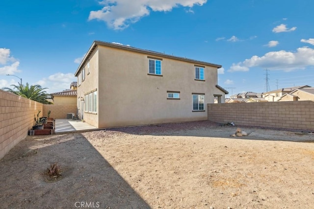 rear view of property with a patio