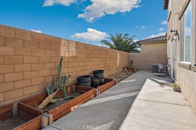 view of patio / terrace featuring cooling unit