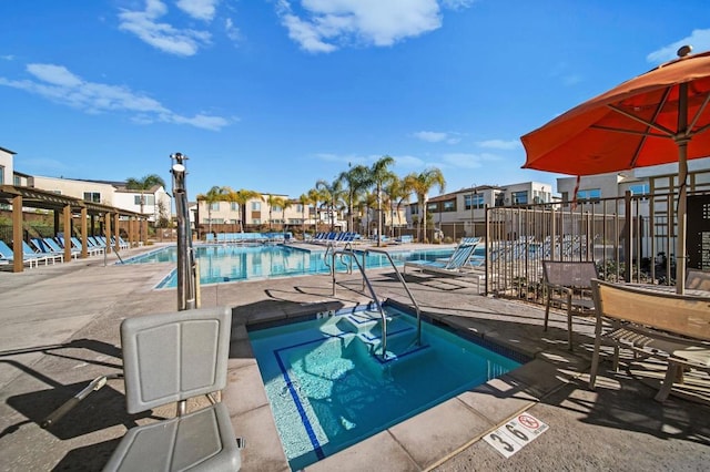 view of pool featuring a patio area