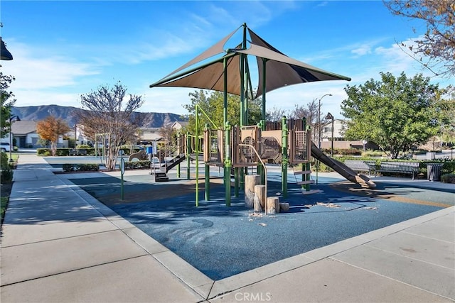 view of play area featuring a mountain view