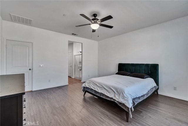 bedroom featuring ceiling fan and hardwood / wood-style floors