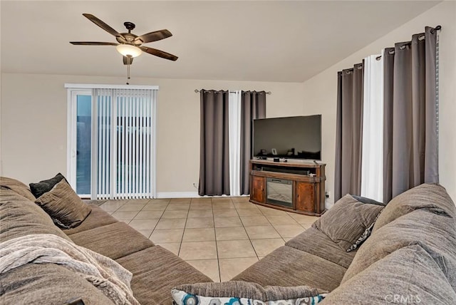 tiled living room with ceiling fan