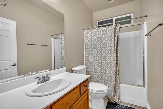 full bathroom featuring tile patterned flooring, toilet, vanity, and shower / tub combo with curtain