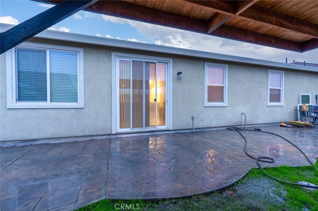 rear view of property with a patio area