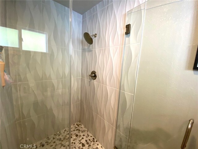 bathroom featuring walk in shower