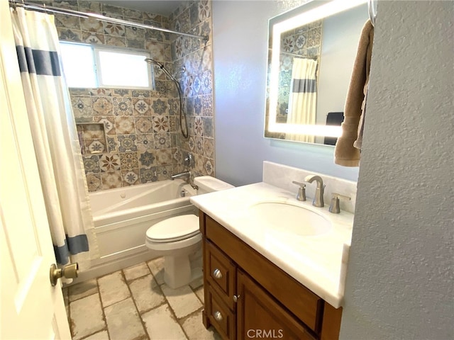 full bathroom with toilet, vanity, and shower / tub combo with curtain