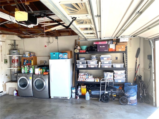 garage with secured water heater, washing machine and dryer, and white fridge