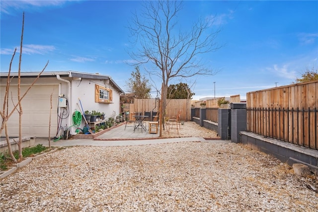 view of yard with a patio area