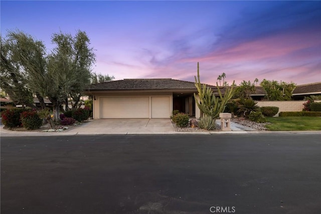 view of front of home featuring a garage