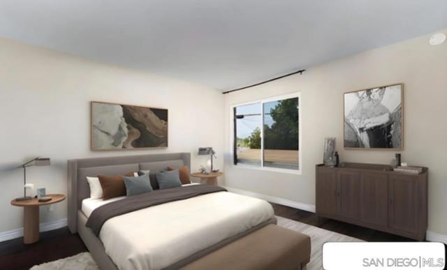 bedroom featuring dark hardwood / wood-style flooring