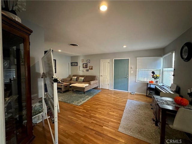 living room with hardwood / wood-style floors