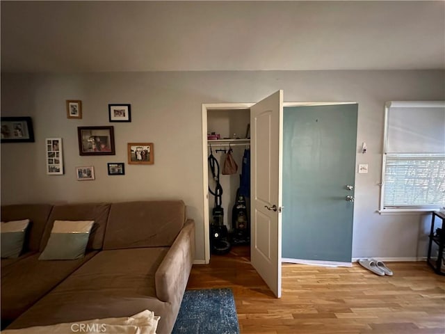 living room with light hardwood / wood-style floors