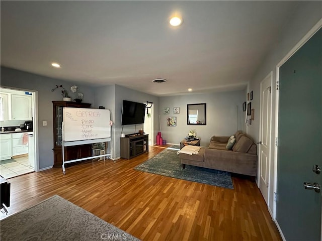 living room featuring hardwood / wood-style floors