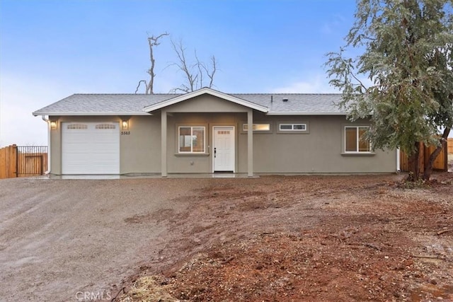 ranch-style home with a garage