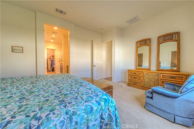 bedroom with light carpet