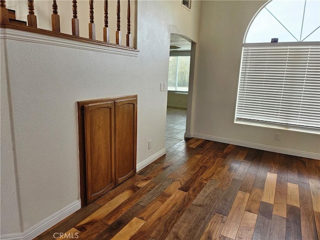 interior space featuring dark wood-type flooring