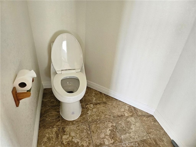 bathroom featuring toilet