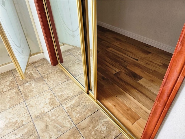 bathroom featuring a shower with shower door