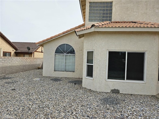 view of home's exterior with a patio