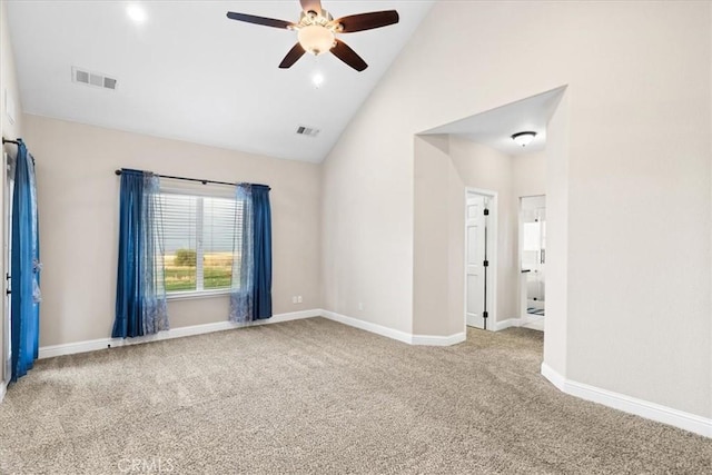 unfurnished room with carpet floors, high vaulted ceiling, and ceiling fan