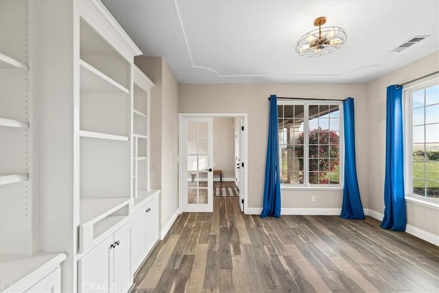 interior space featuring dark hardwood / wood-style floors and french doors