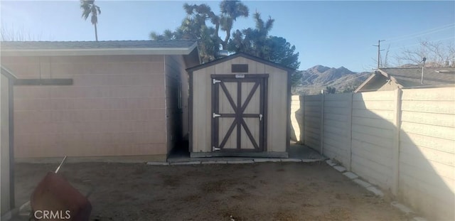 view of outdoor structure with a mountain view