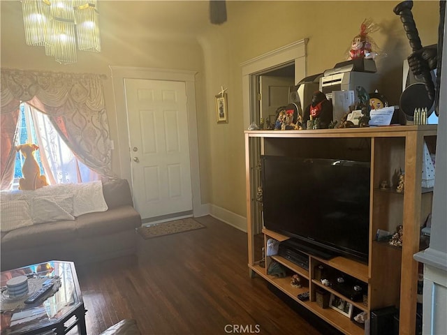 living room featuring dark wood-type flooring