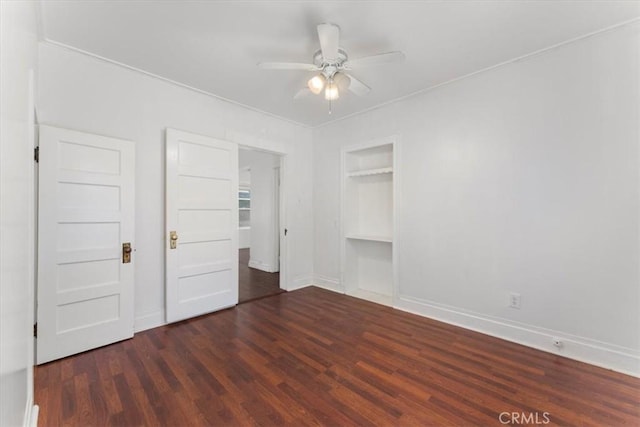 unfurnished bedroom featuring ceiling fan, a closet, and dark hardwood / wood-style flooring