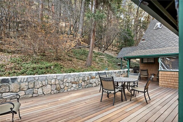 801 Kuffel Canyon Rd, Lake Arrowhead, CA 92385 - wooden terrace with outdoor dining space
