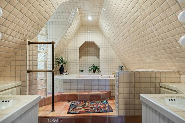 801 Kuffel Canyon Rd, Lake Arrowhead, CA 92385 - bathroom featuring tile walls, vanity, a garden tub, and vaulted ceiling