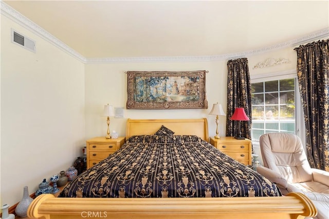 bedroom featuring crown molding