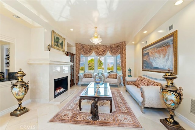 living room featuring light tile patterned floors and an inviting chandelier