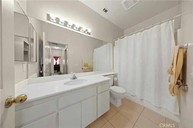 full bathroom featuring toilet, shower / bath combination with curtain, tile patterned floors, and vanity