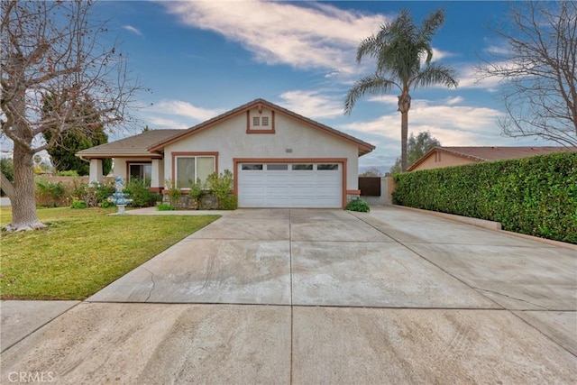 ranch-style home featuring a front lawn and a garage