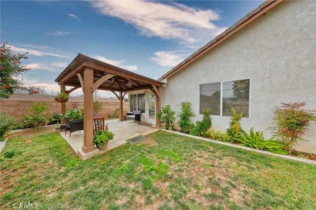 view of yard featuring a patio area and a gazebo