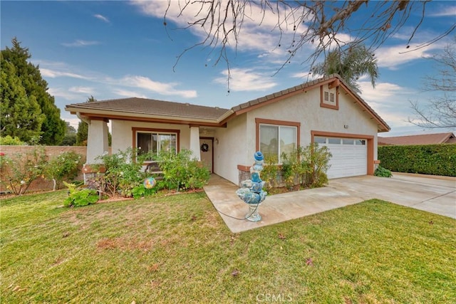 view of front of house featuring a front yard and a garage