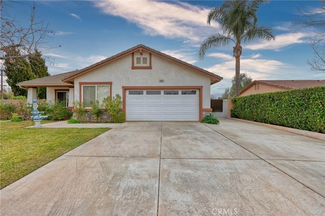 ranch-style home with a front yard and a garage