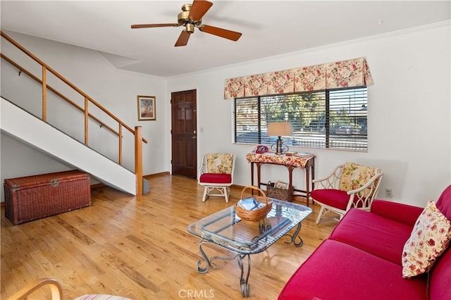 living room with hardwood / wood-style floors and ceiling fan