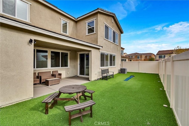 24469 Paxton Ln, Lake Elsinore, CA 92532 - rear view of house featuring stucco siding, a fenced backyard, and a patio area