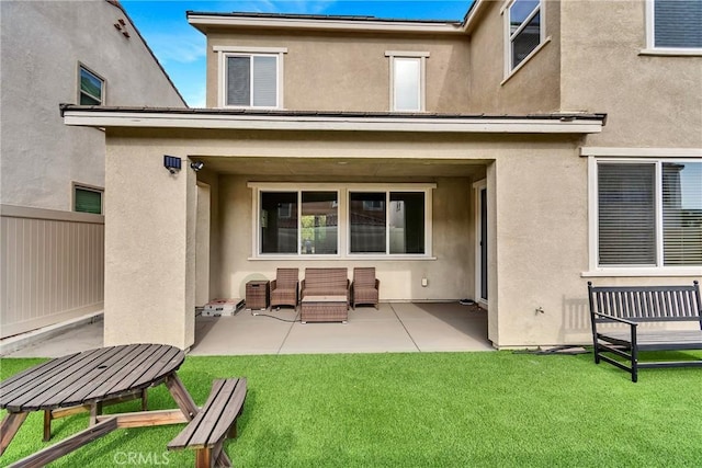 24469 Paxton Ln, Lake Elsinore, CA 92532 - rear view of property featuring stucco siding and a patio area