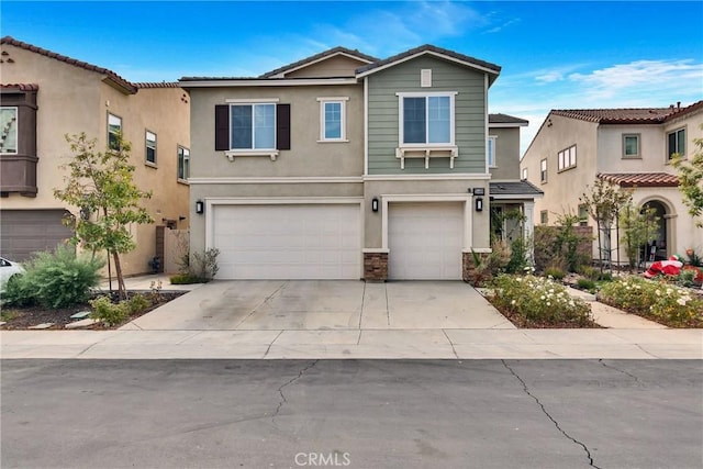 view of front of property featuring a garage