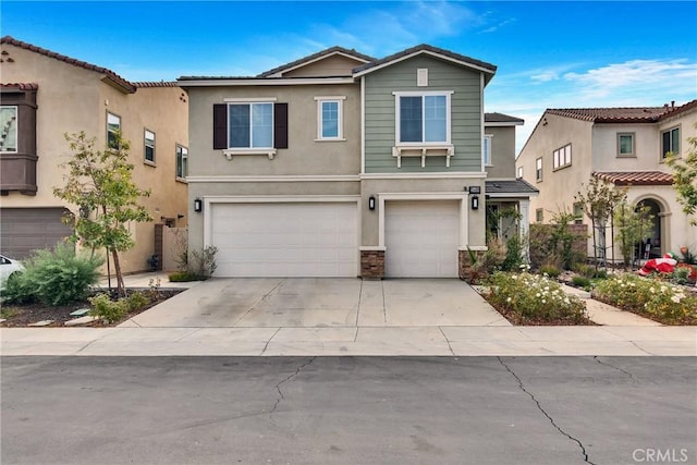 24469 Paxton Ln, Lake Elsinore, CA 92532 - view of front of property with an attached garage, stucco siding, and driveway