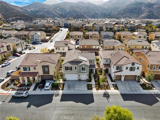 24469 Paxton Ln, Lake Elsinore, CA 92532 - aerial view of residential area featuring a mountainous background